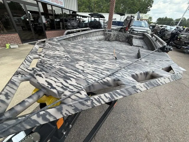 Slide: The Image of The image shows a 2026 Havoc 1756 MSTC boat with a gray camouflage pattern. - 3