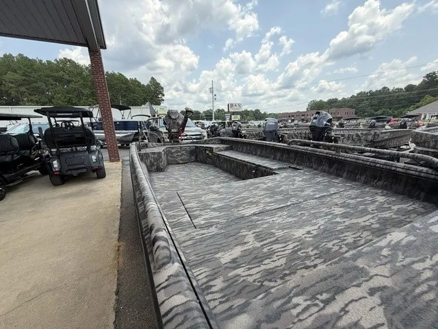 Slide: The Image of The image shows a 2026 Havoc 1756 MSTC boat with a gray camouflage pattern. - 20