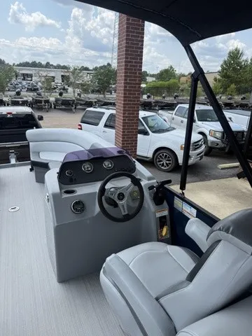 Slide: The Image of The image shows the cockpit of a 2022 Veranda Vista View 22RC with gray seats and a steering wheel. - 17