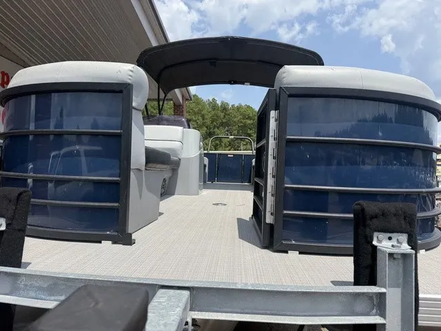 Slide: The Image of A 2022 Veranda Vista View 22RC pontoon boat with spacious deck and seating areas. - 3