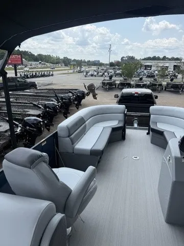 Slide: The Image of The image shows the deck of a 2022 Veranda Vista View 22RC boat with gray seating. - 18