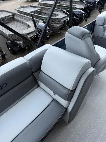 Slide: The Image of The image shows the gray and white seating of a Veranda Vista View 22RC boat. - 20