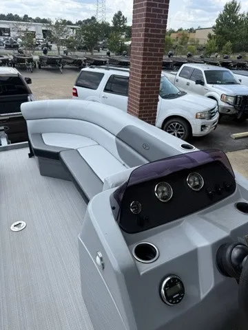 Slide: The Image of The image shows the cockpit of a 2022 Veranda Vista View 22RC boat with gray seating. - 19