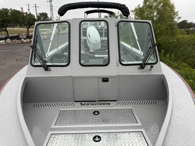 Slide: The Image of The image shows the cockpit of a 2027 Smoker Craft Phantom 20 X2 boat. - 5