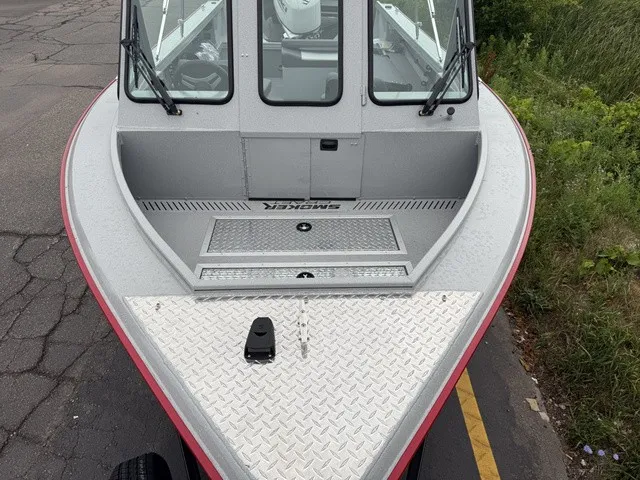 Slide: The Image of The image shows the bow deck of a 2027 Smoker Craft Phantom 20 X2 boat. - 4