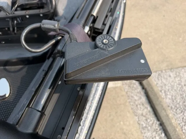 Slide: The Image of Close-up of a Lowrance device on a Phoenix 721 ProXP boat. - 12