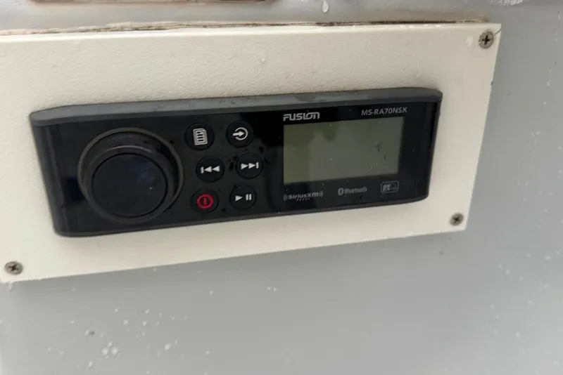 Slide: The Image of Fusion MS-RA70NSX marine stereo on Citation Seapro 220 Aquadek, 1997 model. - 16