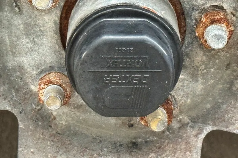 Slide: The Image of Close-up of a Dexter Vortex hub on a 1997 Citation Seapro 220 Aquadek. - 8