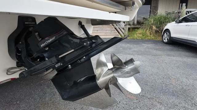 Slide: The Image of Close-up of a MerCruiser drive on a 2015 Sea Ray SLX 250 boat. - 11