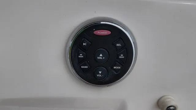 Slide: The Image of Close-up of a round control panel with volume knob and buttons for power and mode. - 14