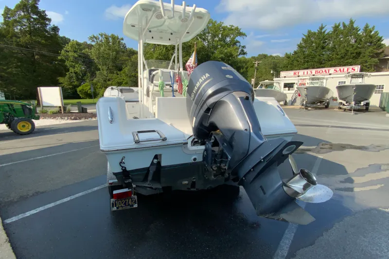 Slide: The Image of 2015 Tidewater 230 CC Adventure boat with Yamaha outboard motor at dealership. - 8