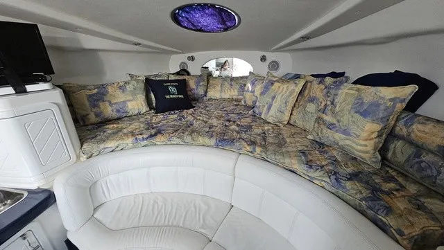 Slide: The Image of Interior of the 2001 Mustang 3200 Sport Cruiser with cozy seating and cushions. - 16