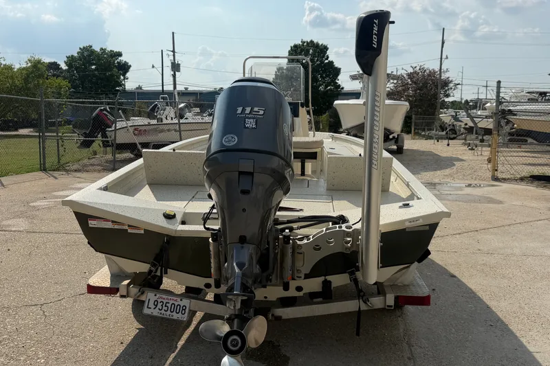 Slide: The Image of 2013 Xpress H20B Bay boat with Yamaha 115 engine on trailer. - 4