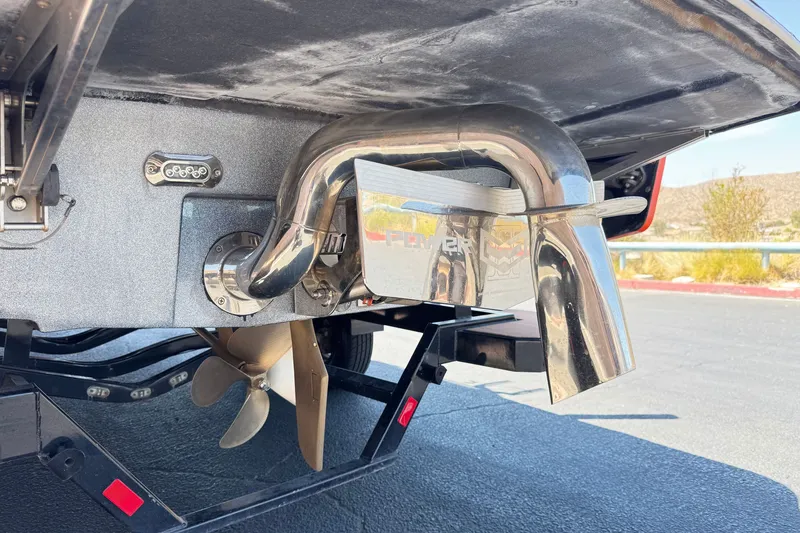 Slide: The Image of 2018 Malibu Wakesetter 22 MXZ boat exhaust and propeller detail. - 7