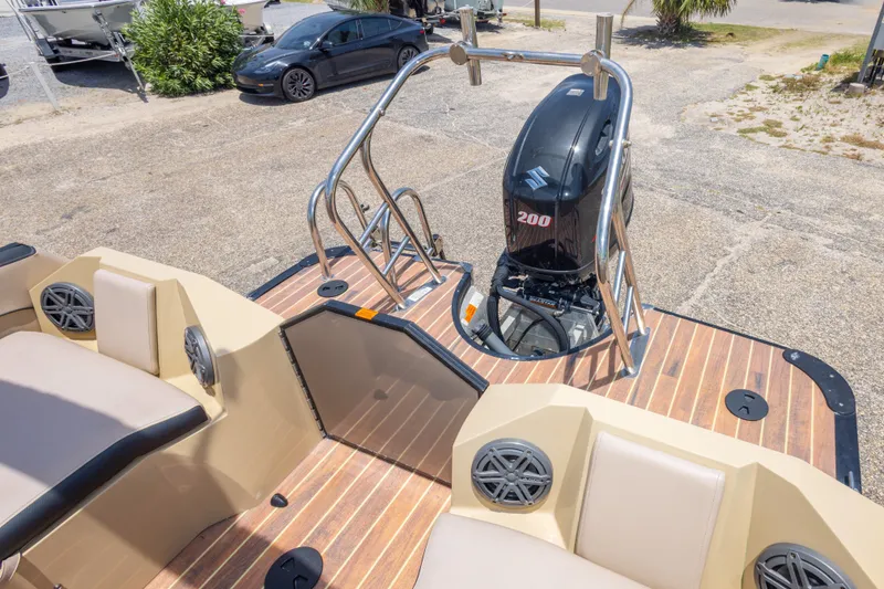 Slide: The Image of 2017 South Bay 523SL boat with Suzuki 200 outboard motor and spacious deck. - 38