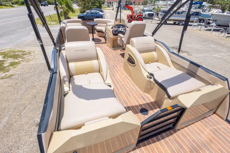 Slide: The Image of 2017 South Bay 523SL pontoon boat with luxurious seating and modern design. - 23