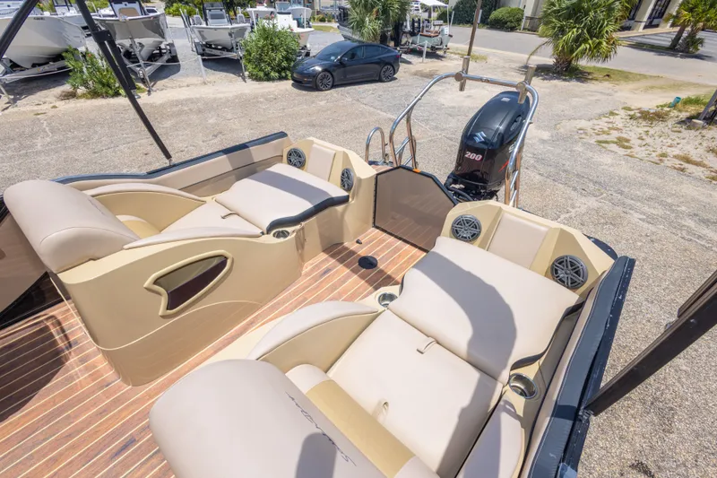 Slide: The Image of Luxurious 2017 South Bay 523SL pontoon boat interior with plush seating and powerful Suzuki engine. - 33