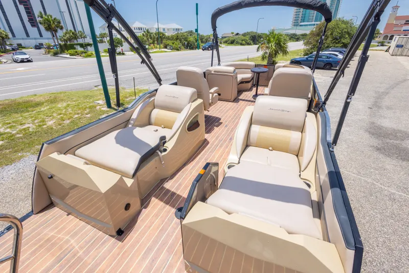 Slide: The Image of 2017 South Bay 523SL pontoon boat with luxurious seating and sleek design. - 18