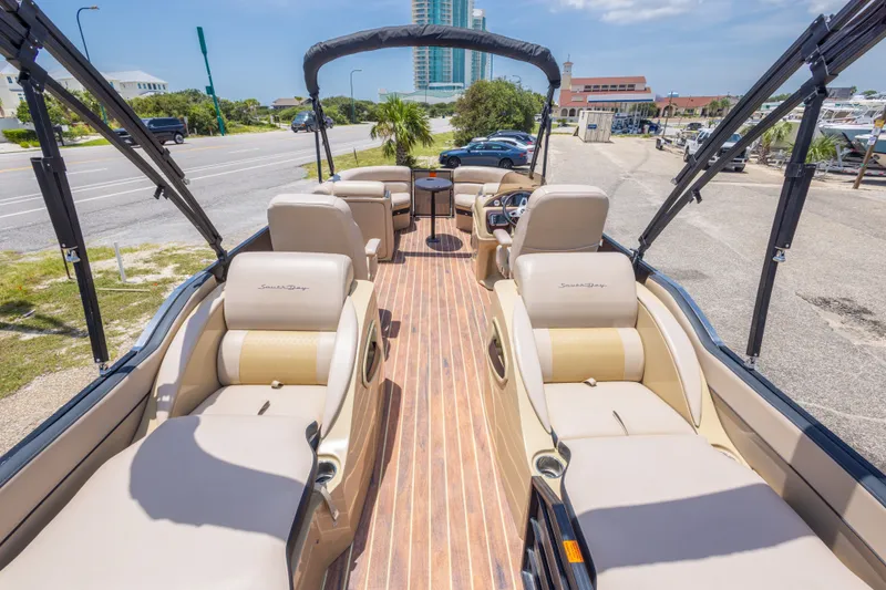 Slide: The Image of Luxurious 2017 South Bay 523SL pontoon boat with spacious seating and elegant design. - 20