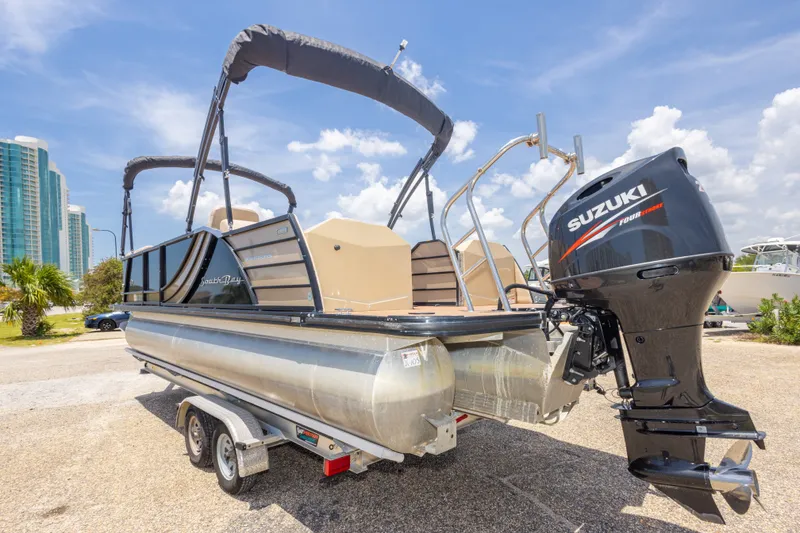 Slide: The Image of 2017 South Bay 523SL pontoon boat with Suzuki outboard motor on trailer. - 15