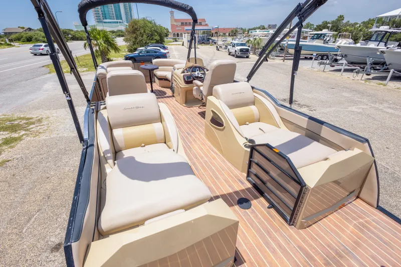 Slide: The Image of 2017 South Bay 523SL pontoon boat with luxurious seating and modern design. - 19