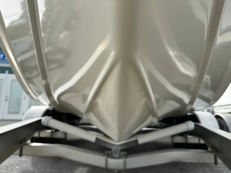 Slide: The Image of Close-up of the hull of a Sea Chaser 20 HFC boat on a trailer. - 6