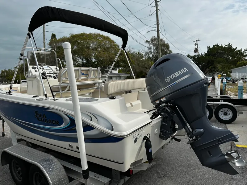 Slide: The Image of A 2016 Sea Chaser 20 HFC boat on a trailer with a Yamaha outboard motor. - 4