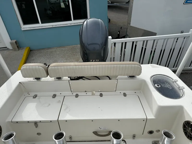 Slide: The Image of The image shows the stern of a 2016 Sea Chaser 20 HFC boat with an outboard motor. - 23