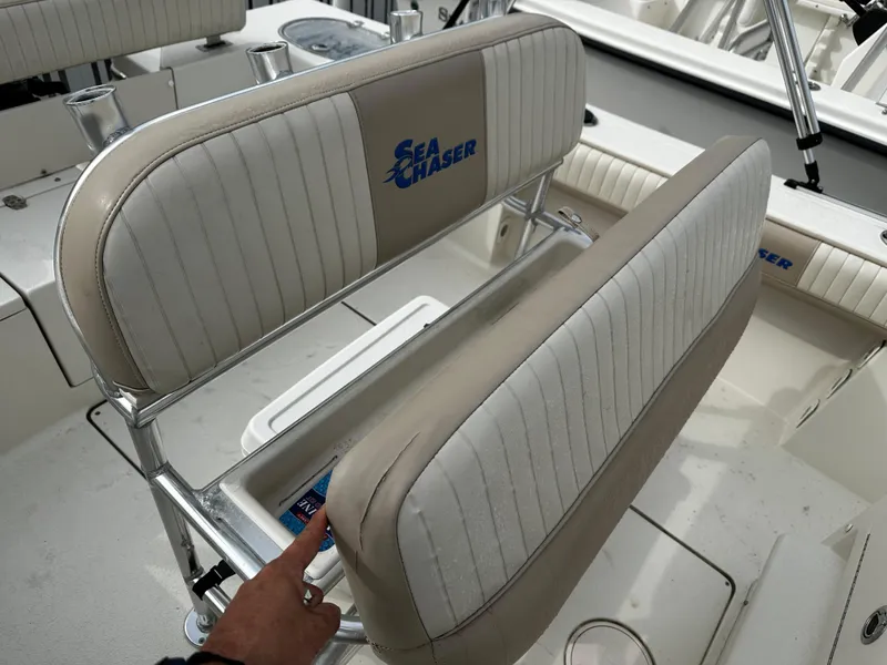 Slide: The Image of The 2016 Sea Chaser 20 HFC features cushioned seats with a logo on the backrest. - 36