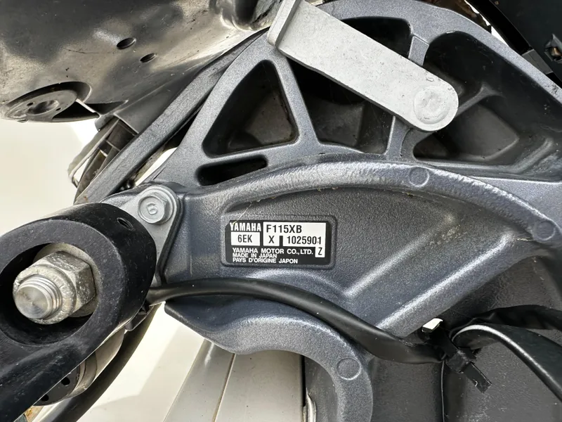 Slide: The Image of Close-up of a Yamaha F115XB outboard motor on a Sea Chaser 20 HFC boat. - 11