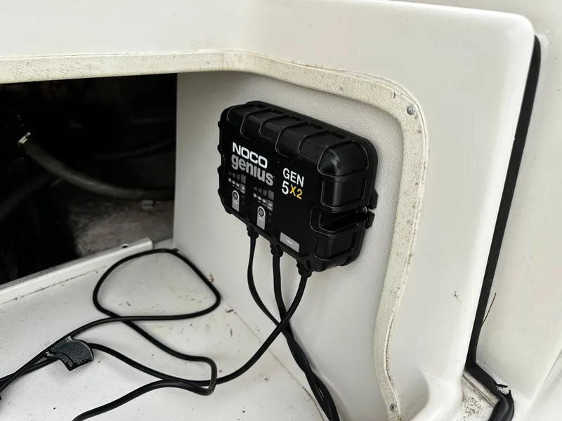 Slide: The Image of A NOCO Genius GEN 5x2 charger is installed in a white boat. - 29