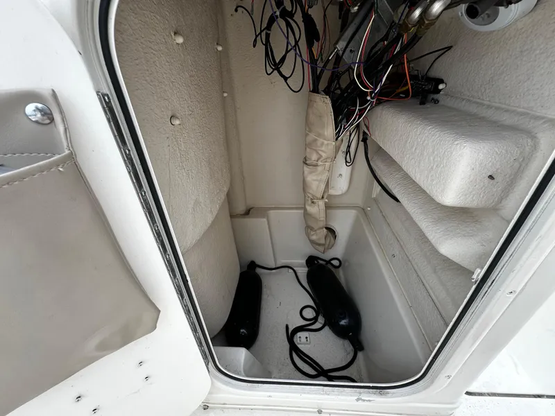 Slide: The Image of Interior of a 2016 Sea Chaser 20 HFC with wires and fenders. - 48