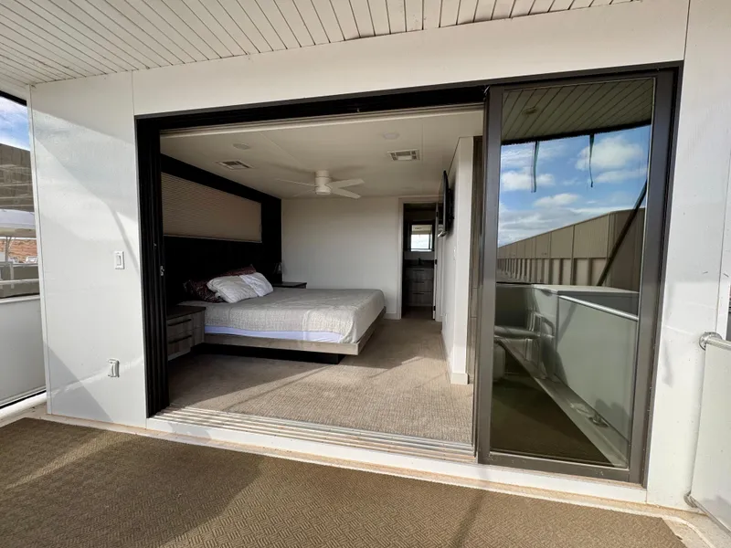 Slide: The Image of Modern bedroom with balcony view in Adonia Solace Trip #16, 2021 model. - 19