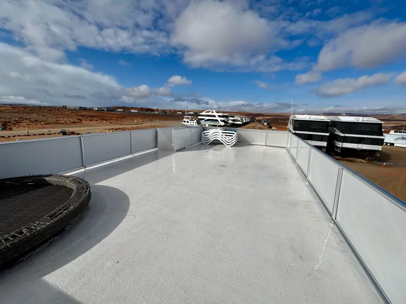 Slide: The Image of Rooftop view of Adonia Solace Trip #16, 2021, under a partly cloudy sky. - 28