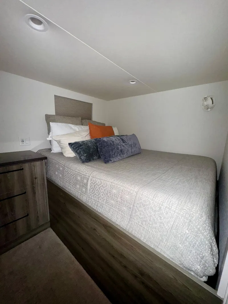 Slide: The Image of Cozy bedroom in 2021 Adonia Solace Trip #16 RV with modern decor. - 7
