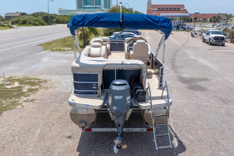Slide: The Image of 2014 Aqua Patio 22 SLC pontoon boat with blue canopy and Yamaha 150 engine. - 37
