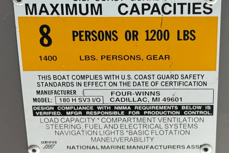 Slide: The Image of 2001 Four Winns 180 Horizon capacity label: 8 persons or 1200 lbs, U.S. Coast Guard compliant. - 25