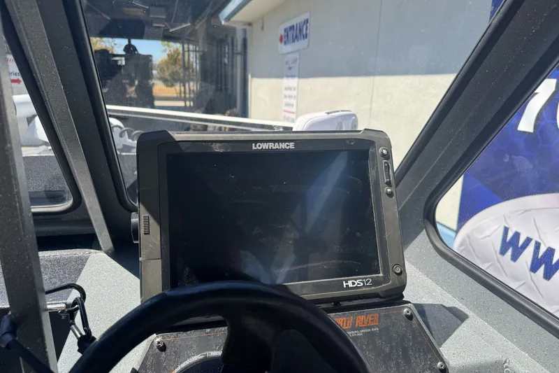 Slide: The Image of Interior view of a 2000 North River 18 Mariner boat with Lowrance HDS12 display. - 21