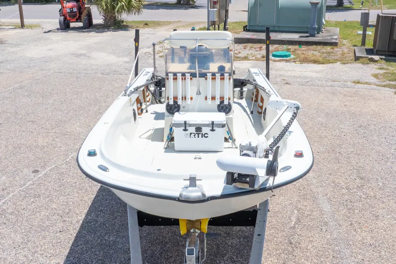 Slide: The Image of 1986 Boston Whaler 18 Outrage boat on trailer, equipped with fishing gear and accessories. - 5