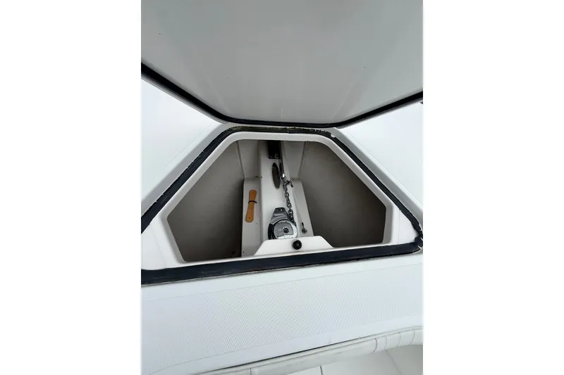 Slide: The Image of Anchor storage compartment on a 2006 Southport 26 Center Console boat. - 23