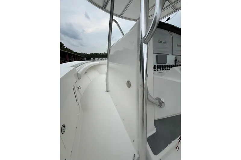 Slide: The Image of 2006 Southport 26 Center Console boat deck with Garmin navigation system. - 19