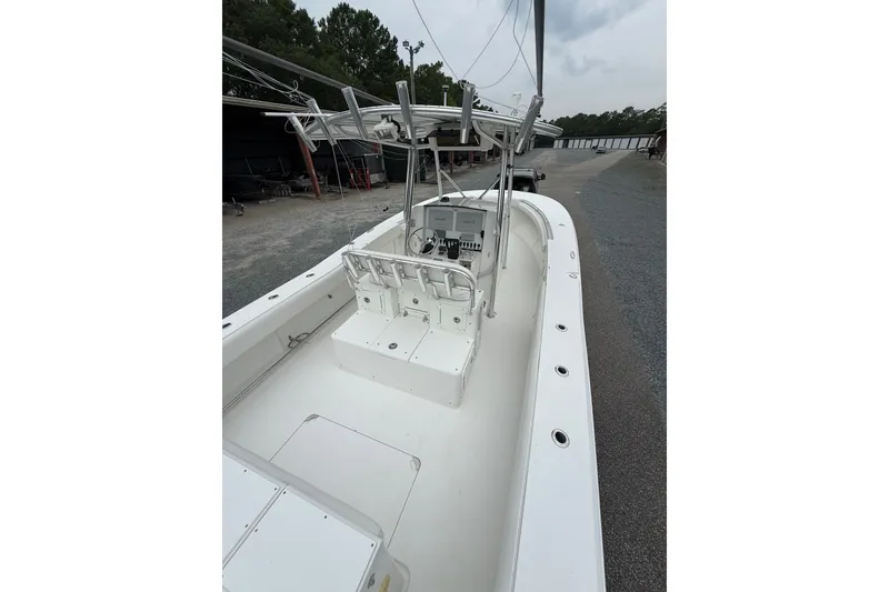 Slide: The Image of 2006 Southport 26 Center Console boat with spacious deck and modern console design. - 9