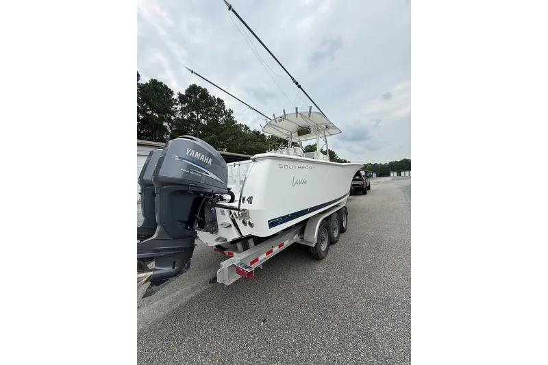 Slide: The Image of 2006 Southport 26 Center Console boat with Yamaha engine on a trailer. - 5