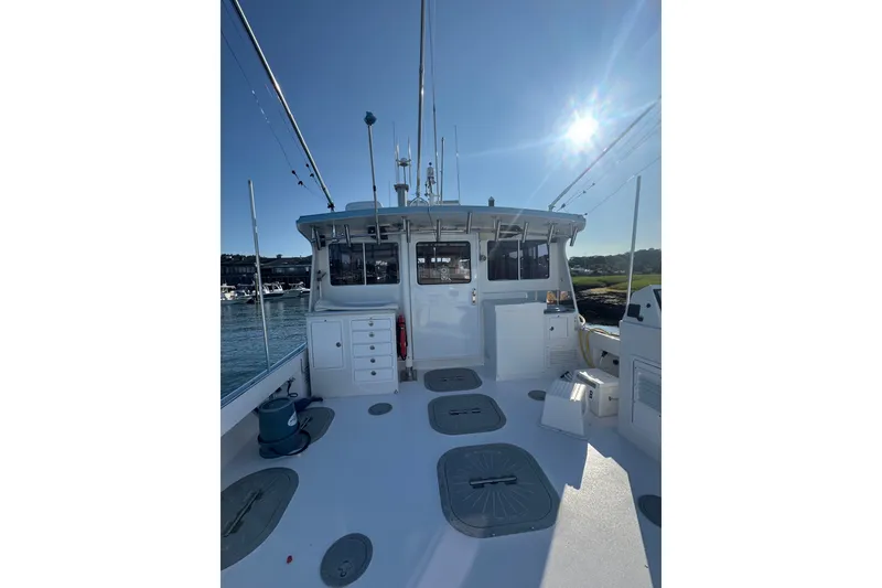 Slide: The Image of 2016 Young Brothers Downeast boat deck under clear blue sky. - 8