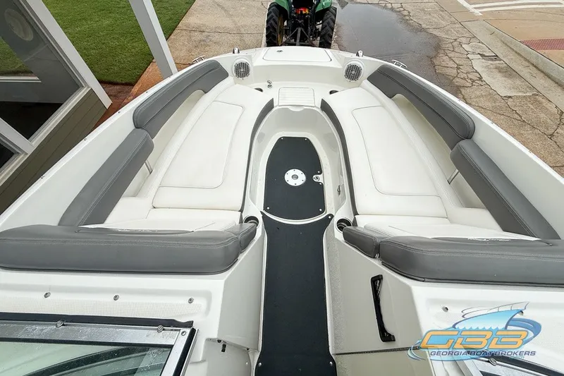 Slide: The Image of 2011 Sea Ray 260 Sundeck interior with spacious seating and sleek design. - 7