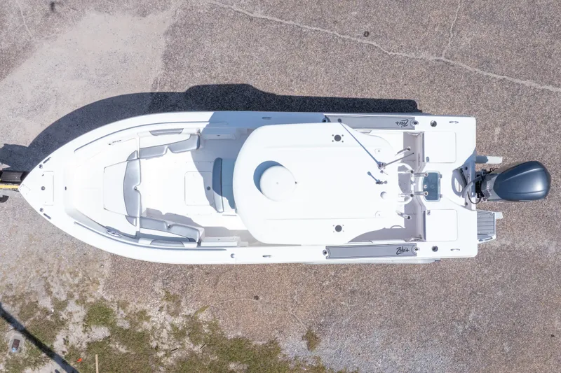 Slide: The Image of Overhead view of a 2012 Everglades 243 Center Console boat on a concrete surface. - 6