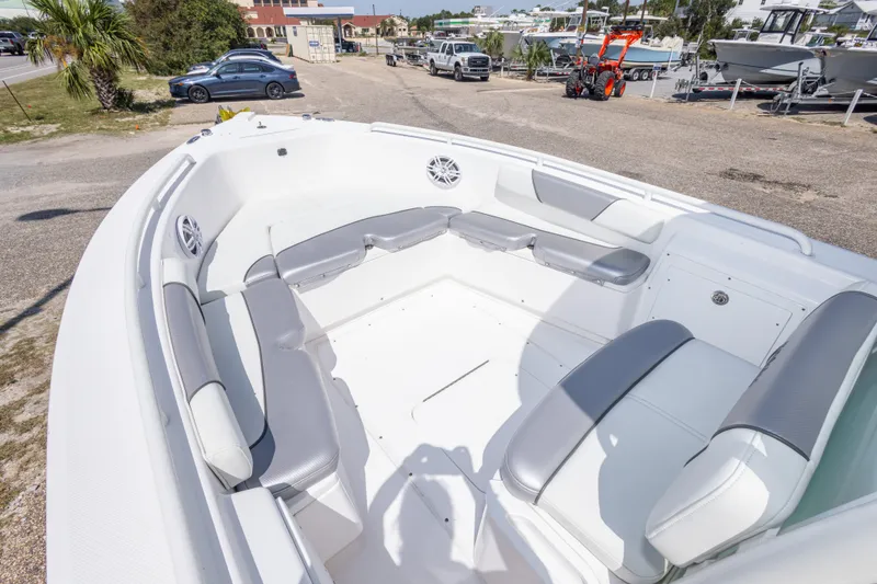 Slide: The Image of 2012 Everglades 243 Center Console boat with spacious seating and modern design. - 28