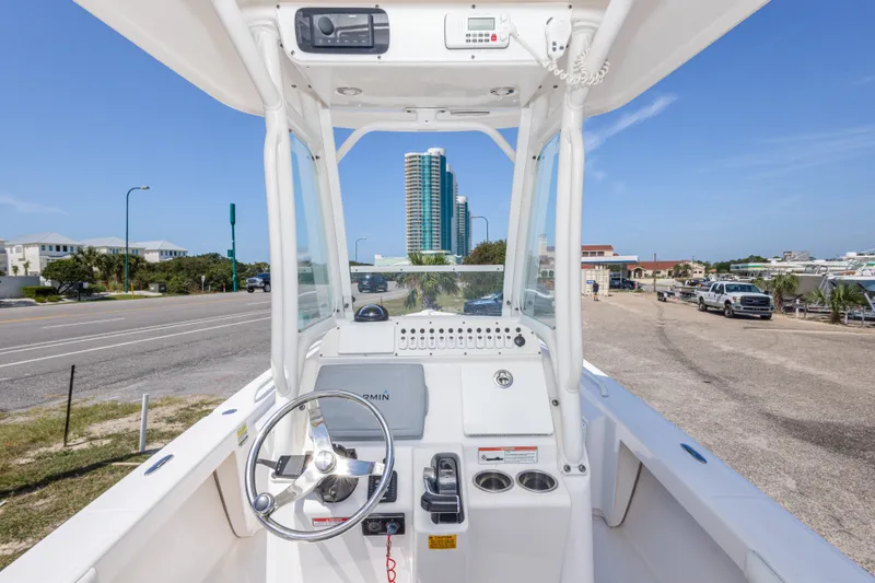 Slide: The Image of 2012 Everglades 243 Center Console boat with urban skyline in background. - 22