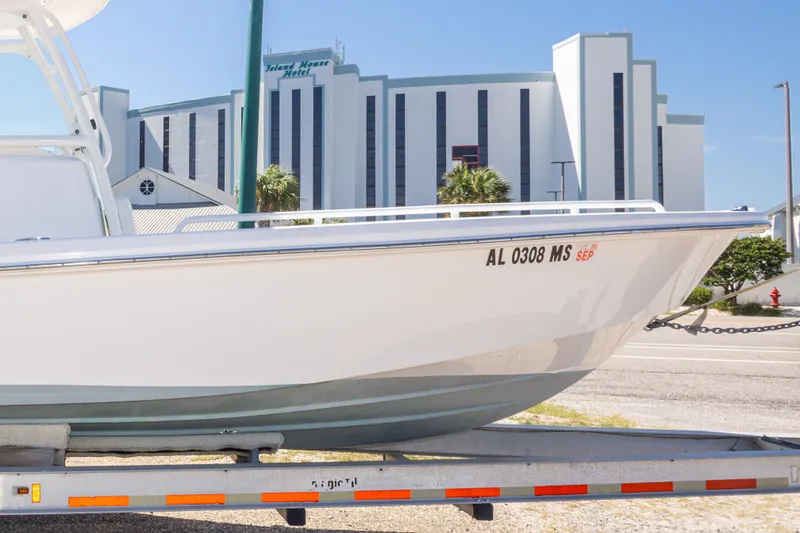 Slide: The Image of 2012 Everglades 243 Center Console boat on trailer near Island House Hotel. - 46