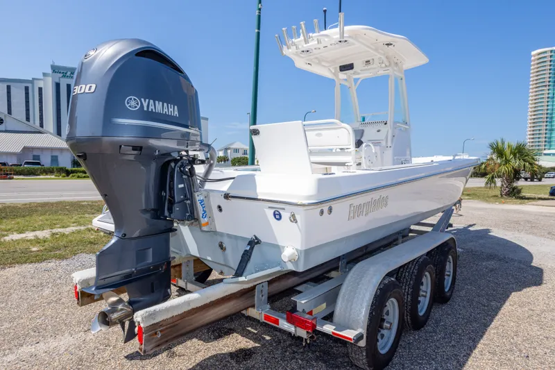 Slide: The Image of 2012 Everglades 243 Center Console boat with Yamaha engine on a trailer. - 11